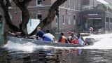 Patients and staff of the Memorial Medical Center in New Orleans are evacuated by boat after floodwater surrounded the facility on Aug. 31, 2005.