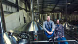 BrewDog founders James Watt, left, and Martin Dickie at their production facility in Ellon, Scotland.