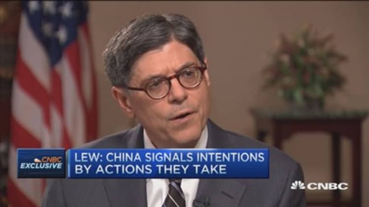 Holding China accountable: Lew