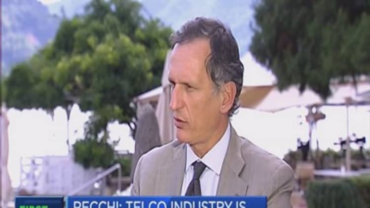 Telecom Italia chairman denies planning a stock conversion