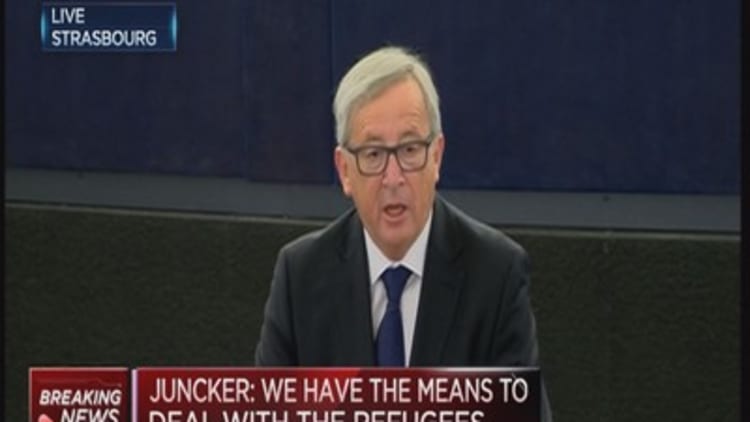 EU has the means to deal with refugees: Juncker