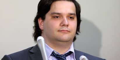 Chief of bitcoin exchange Mt. Gox denies embezzlement as trial opens