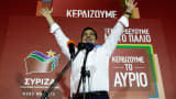 Alexis Tsipras, Greece's incoming prime minister and leader of the Syriza party, celebrates as he secures victory in the general election in Athens on Sunday.