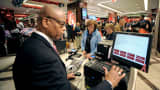 Shoppers pay for items at a Macy's store in New York.