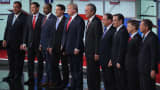 Republican presidential candidates (L-R) New Jersey Gov. Chris Christie, Sen. Marco Rubio (R-FL), Ben Carson, Wisconsin Gov. Scott Walker, Donald Trump, Jeb Bush, Mike Huckabee, Sen. Ted Cruz (R-TX), Sen. Rand Paul (R-KY) and John Kasich take the stage for the first prime-time presidential debate hosted by FOX News and Facebook at the Quicken Loans Arena August 6, 2015 in Cleveland, Ohio. The top-ten GOP candidates were selected to participate in the debate based on their rank in an average of the five most recent national political polls.