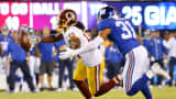 Andre Roberts of the Washington Redskins attempts to catch a pass against Trevin Wade of the New York Giants at MetLife Stadium on Sept. 24, 2015, in East Rutherford, New Jersey.