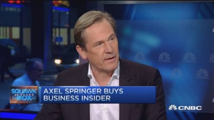 Axel Springer buys Business Insider