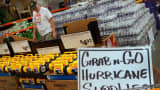 A customer shops for hurricane supplies at Home Depot as he prepares for the possible arrival of Hurricane Irene on August 22, 2011 in West Palm Beach, Florida.