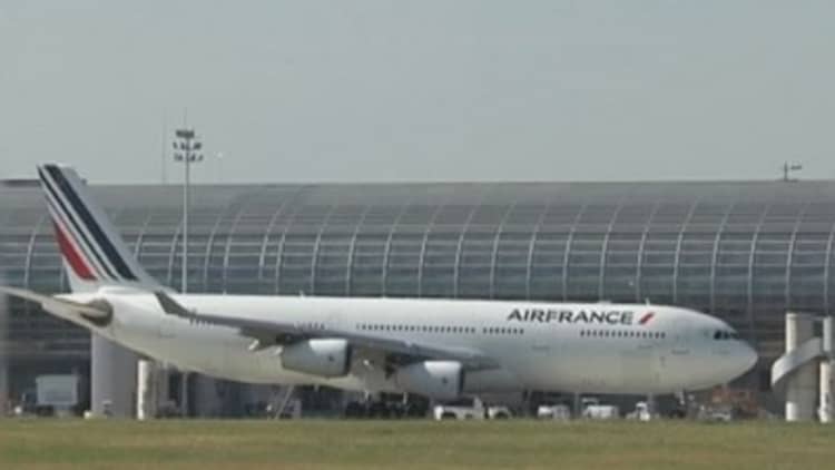 Air France workers storm managerial meeting