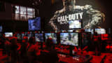 Attendees play the "Call of Duty: Black Ops III" game by Activision Blizzard Inc. during the E3 Electronic Entertainment Expo in Los Angeles.