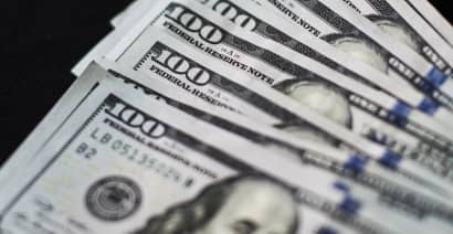 Dollar tiptoes higher for third day ahead of expected Fed hike  