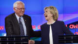 Democratic presidential candidate and former Secretary of State Hillary Clinton shakes hands with rival candidate and U.S. Senator Bernie Sanders (L) and thanks him for saying that he and the American people are sick of hearing about her State Department email controversy and want to hear about issues that effect their lives as they participate in the first official Democratic candidates debate of the 2016 presidential campaign in Las Vegas, Nevada October 13, 2015.