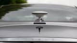 A GPS driving sensor antennae sits on the back of a Tesla Motors Inc. Model S electric automobile at the Robert Bosch GmbH driverless technology press event in Boxberg, Germany, on Tuesday, May 19, 2015.