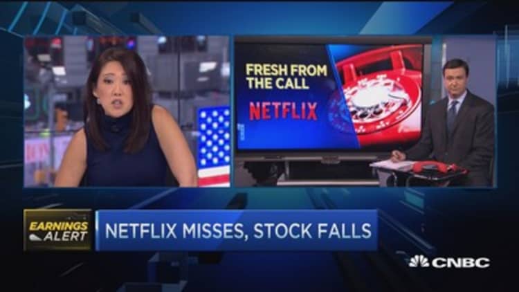 Netflix falls on earnings