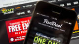 The FanDuel Inc. app and DraftKings Inc. website are arranged for a photograph in Washington, D.C.