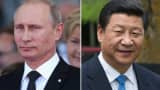 Russian President Vladimir Putin (L) and Chinese President Xi Jinping (R).