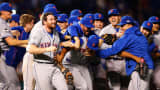 The New York Mets celebrate after defeating the Chicago Cubs in Game 4 of the National League Championship Series at Wrigley Field on October 21, 2015, in Chicago.