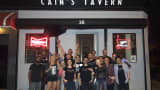 Bartenders and regulars of Cain’s Tavern, a Brooklyn bar that shuttered in August.