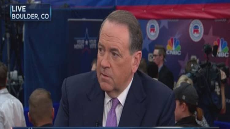 Huckabee post debate: Leadership is the ability to do something 