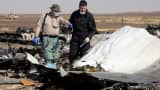 Egyptian officials inspect the crash site of Russian Airliner in Suez, Egypt on November 01, 2015. A Russian Airbus-321 airliner with 224 people aboard crashed in Egypt's Sinai Peninsula on yesterday.