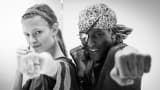 Trainer Michael Olajide with Victoria's Secret Fashion Show model Constance Jablonski at Aerospace in New York.