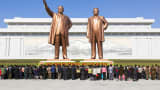 The statues of former North Korean Presidents Kim Il Sung and Kim Jong Il at Pyongyang are a major tourist attraction