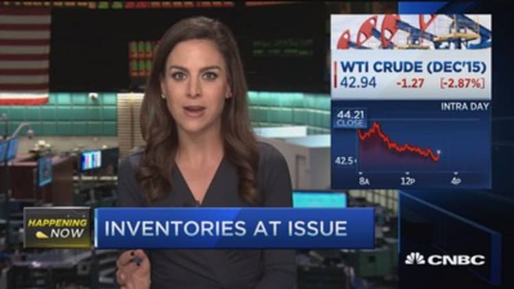 Inventories drive oil lower