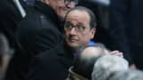 French President Francois Hollande is escorted out of the Stade de France by his security team before the end of the France v Germany International Friendly match on November 13, 2015 in Paris, France.