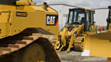 Caterpillar Inc. bulldozers sit outside the Altorfer Cat dealership in East Peoria, Illinois.