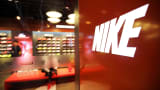 The Nike Inc. logo is displayed at the entrance to the company's store in the East Nanjing Road shopping area of Shanghai, China.