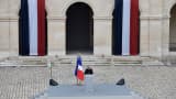 French President Francois Hollande delivers a speech during the national tribute