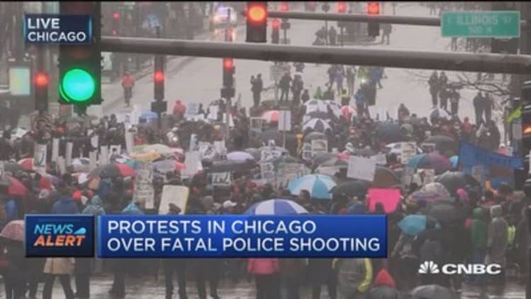 Protesters disrupt Michigan Avenue over fatal shooting