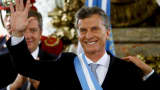 Argentina's President Mauricio Macri waves after being sworn-in as president at Casa Rosada Presidential Palace in Buenos Aires, Argentina, December 10, 2015.