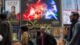 A 'Star Wars: The Force Awakens' advertisement is seen in Times Square on December 11, 2015 in New York City. Disney acquired Lucasfilm studios and the rights to the Star Wars franchise in 2013 for $4 billion.