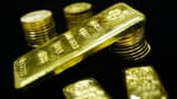 Gold bullion bars and coins.