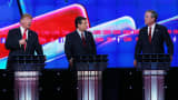Republican presidential candidates Donald Trump (L) and Jeb Bush (R) respond to each other as U.S. Sen. Ted Cruz (R-TX) listens during the CNN debate on Dec. 15, 2015 in Las Vegas.