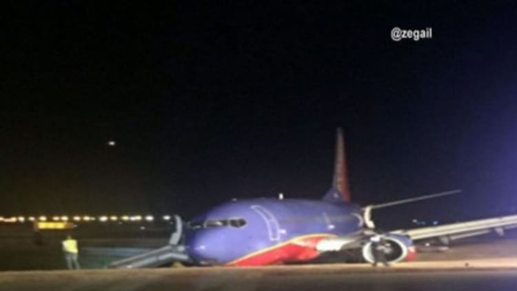 Plane rolls off runway at Nashville International Airport