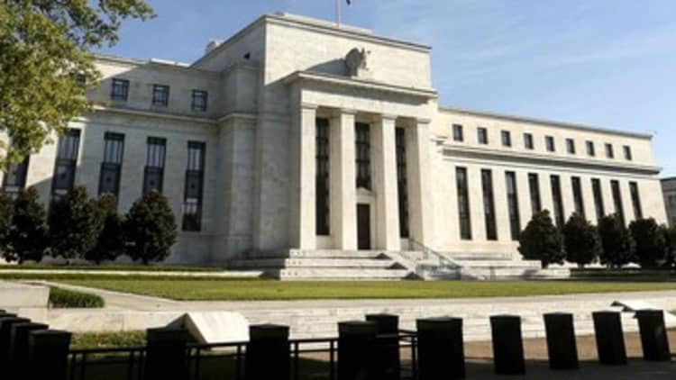 Fed raises by quarter point