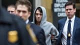 Martin Shkreli, CEO of Turing Pharmaceutical, is brought out of 26 Federal Plaza by law enforcement officials after being arrested for securities fraud on Dec. 17, 2015, in New York City.