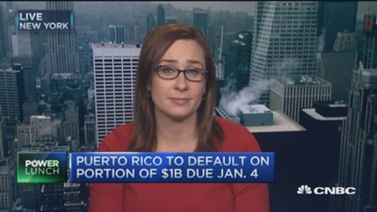Puerto Rico seeks solutions after defaulting on part of its $1B debt