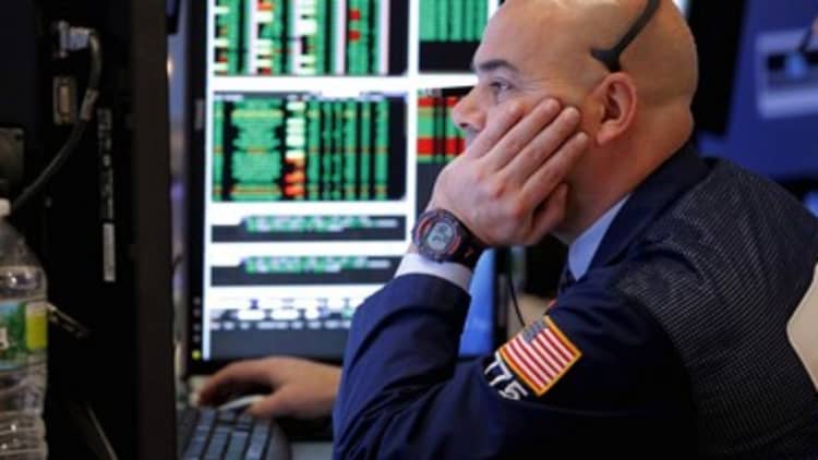 Dow plunges triple digits after China market rout