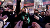 Iranian protesters chant slogans as they hold pictures of Shi'ite cleric Sheikh Nimr al-Nimr during a demonstration against the execution of Nimr in Saudi Arabia, outside the Saudi Arabian Embassy in Tehran January, 3, 2016.