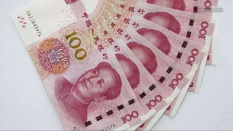 China FX reserves fall $512B in 2015
