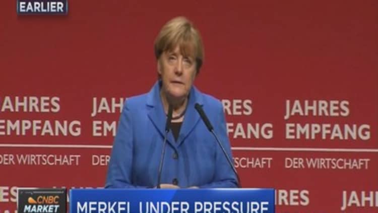 Angela Merkel faces pressure over Germany's migrant crisis