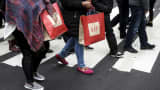 Shoppers carrying GAP bags in New York.