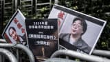 Placards showing missing booksellers Lee Bo (L) and Gui Minhai (R) in Hong Kong on January 19, 2016.