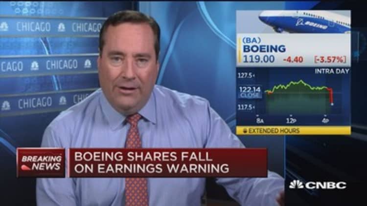 Boeing to cut 747 production in half
