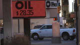 The price of oil is shown downtown on Jan. 21, 2016, in the oil town of Midland, Texas.