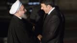 Matteo Renzi, Italy's president, right, greets Hassan Rouhani, Iran's president, before their meeting at Capitol Hill in Rome, Italy, on Monday, Jan. 25, 2016.
