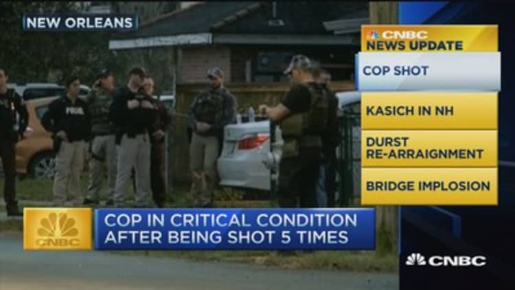 CNBC update: New Orleans cop shot, bridge implodes